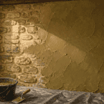 enduit correcteur thermique appliqué sur mur ancien